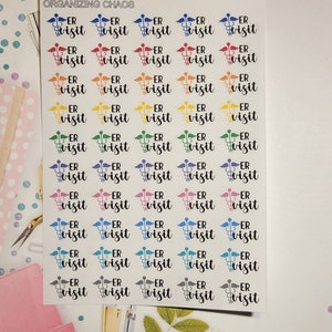 May include: A sheet of stickers with a rainbow of colors featuring a medical symbol and the text "ER visit".