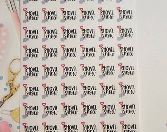 May include: A sheet of 36 stickers featuring a cartoon shovel with the text "SHOVEL SNOW" repeated on each sticker. The stickers are white with red, brown, and gray accents.