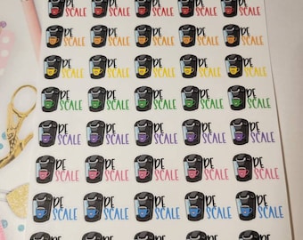 May include: A sheet of stickers featuring a coffee pot with a cup of coffee and the text "Breale Scale". The stickers are in various colors, including red, blue, green, yellow, and purple.