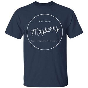 May include: Navy blue t-shirt with a white circle graphic that says "Mayberry" and "EST. 1864" with the text "Founded by James Merriweather" below the circle.