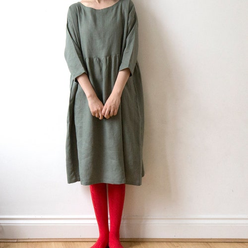muted green dress Soft Basil Green, Neutral Solid Color" A-Line for Sale by TGIYHome and good for every body type. SPINE OPEN BACK SIDE DROP