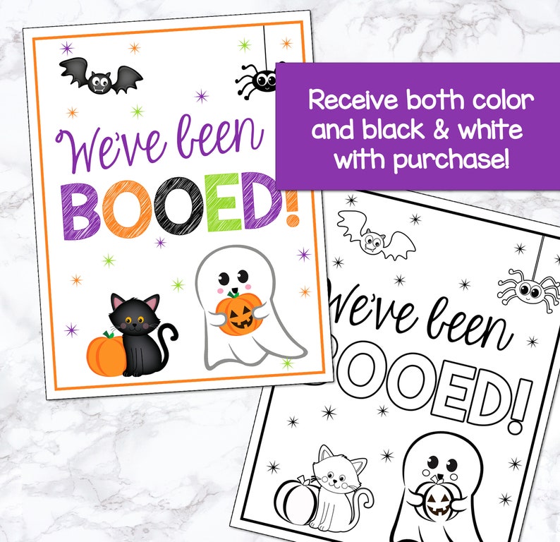 May include: A printable Halloween sign with the text "We've been BOOED!" in black, orange, and purple. The sign features a ghost holding a pumpkin, a black cat, and a spider. A black and white version of the sign is also included.