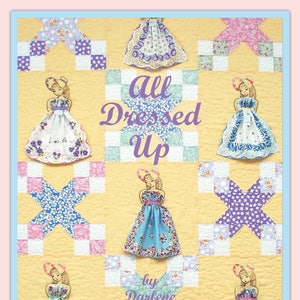 All Dressed Up, a 1930s era quilt pattern by Darlene Zimmerman. Uses hankies or a hanky print, 3-D dolls, embroidery