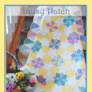 Daisy Patch , ein Muster aus den 1930er Jahren von Darlene Zimmerman. Einfaches Zusammennähen, Eistüten-Bordüre, drei Größen.