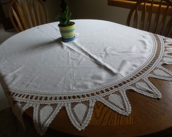 Fabulous Vintage Tablecloth with 8" wide hand crocheted edging, 64" across, round
