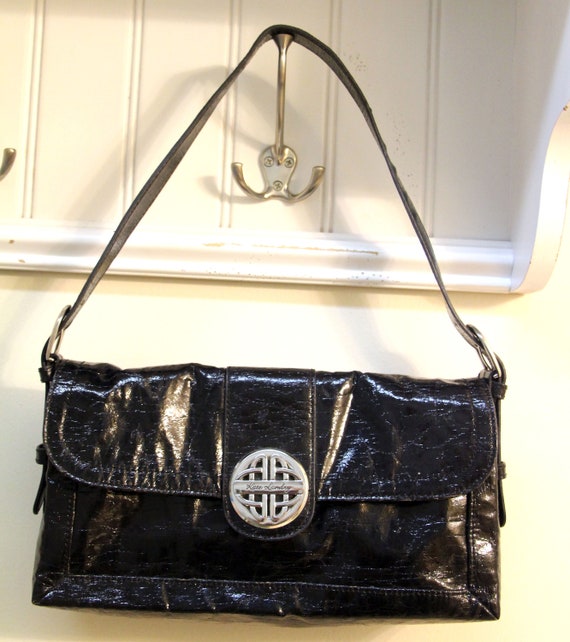 Black faux leather handbag