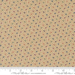May include: A beige fabric with a repeating pattern of small, stylized leaves in shades of blue, green, red, and orange.