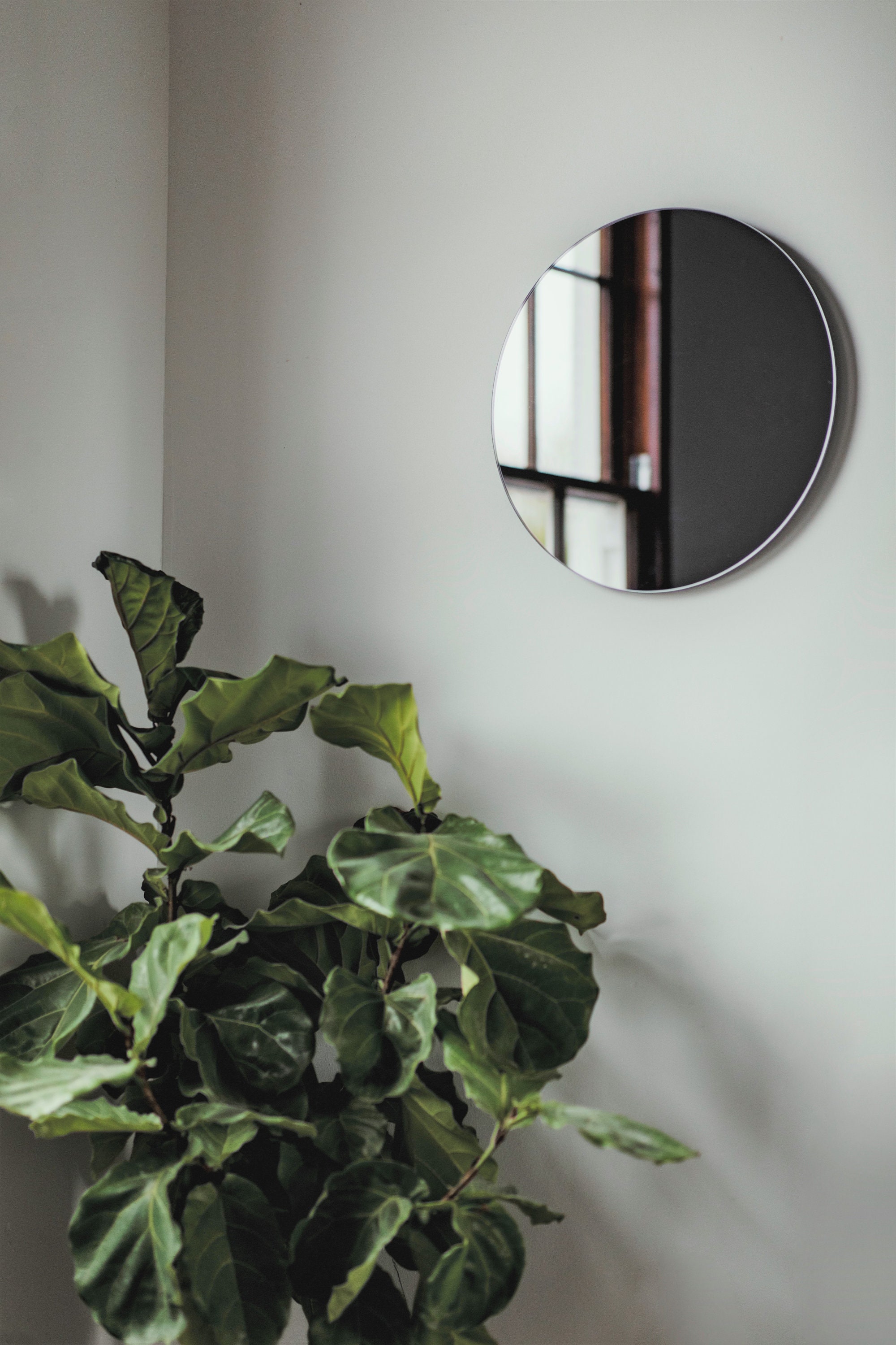 Orbis™ Round Black Tinted Contemporary Frameless Mirror 