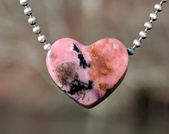 Rhodonite from BC hand carved into a heart shaped pendant for your own crystal charm necklace or diy jewelry