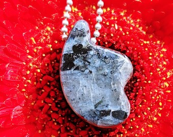 Flashy Larvikite from Norway hand carved into a petal or wing shaped pendant for a statement piece or your own design