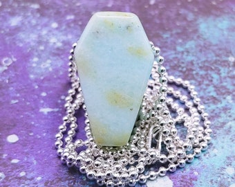 Light blue old stock Chrysoprase from chile hand carved into a coffin pendant for Halloween jewelry or your bead creations