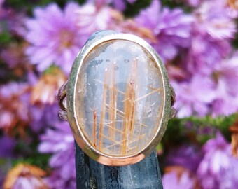 Rutilated Quartz from Brazil hand carved into an oval with sterling silver ring size 8