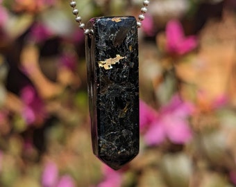 Greenland Nuummite with golden flash hand carved into a pendant pendulum for grids on the go or for your own personal jewelry making