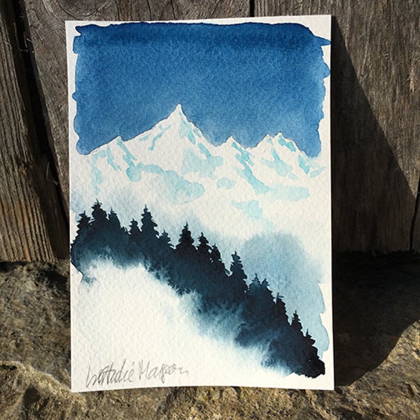 Petite aquarelle montagne en hiver ciel bleu