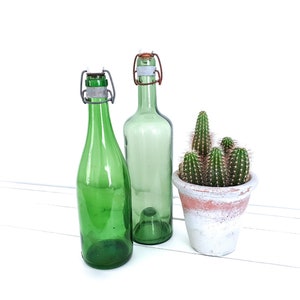 Vintage green bottles with clip closure • antique green bottles with porcelain cap • French farmhouse style decor • old glass bottles