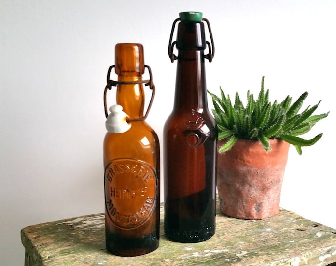 Great set of vintage rustic glass beer bottles