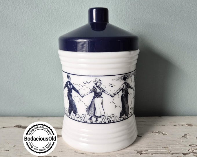 Vintage Dutch Opaline storage jar with folkloric design