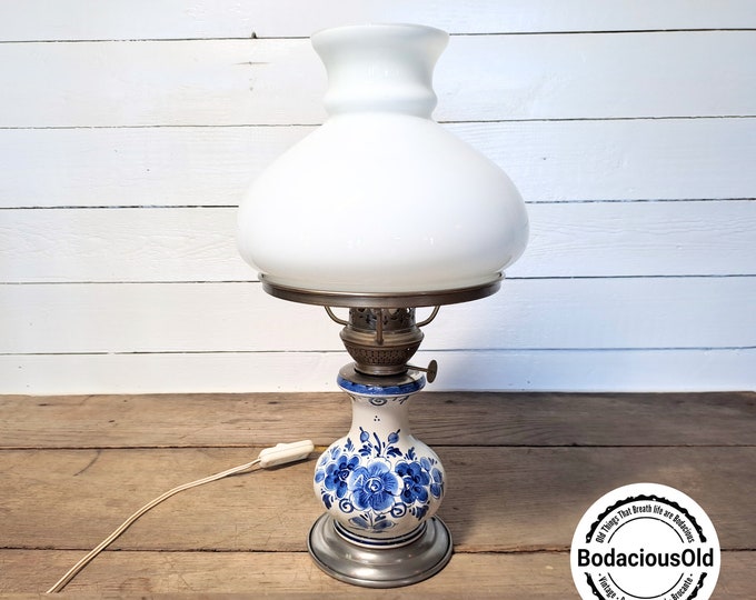 Vintage charm: Delft blue table lamp with frosted glass shade and original tin foot made by Rio The Netherlands