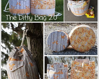 May include: A set of six drawstring bags in two different fabric patterns. The bags are made of a grey and orange fabric with a fox print. The bags are shown in different positions, including one with a drawstring pulled tight and one with the drawstring open. The text "The Ditty Bag 2.0" is visible in the image.