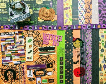 May include: A Halloween-themed scrapbook layout with various decorative elements. Includes patterned paper strips, stickers, and embellishments featuring pumpkins, spiderwebs, and the text "Witch is In" and "Spooky". A small bowl holds miniature witch hats and the word "Scary".