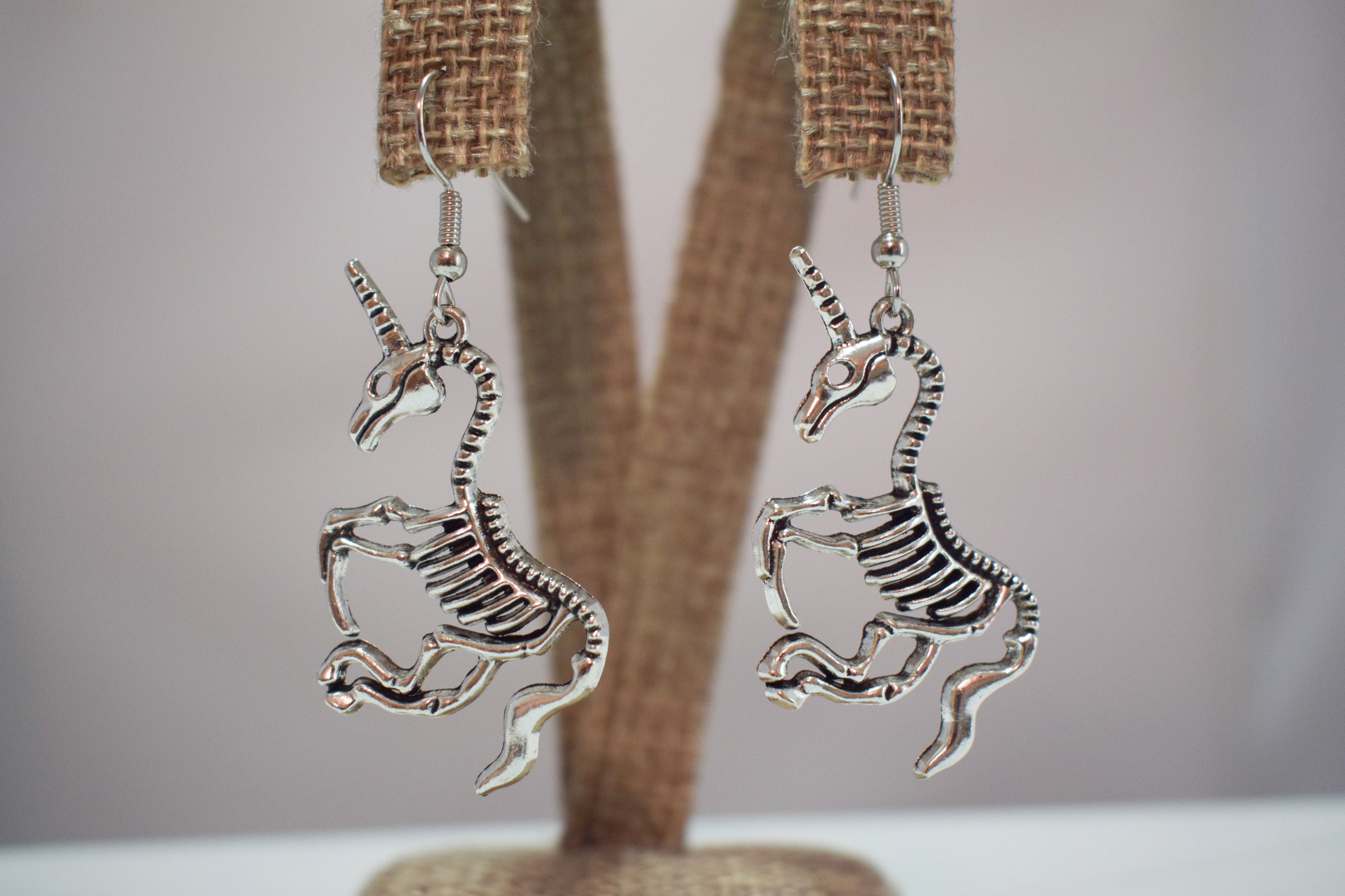 Skeleton unicorn earrings hot sale