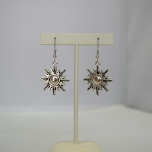Pendientes grandes con forma de sol