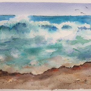 May include: Watercolor painting of a seascape with blue and green waves crashing on a sandy beach. The sky is a light blue with a few birds flying in the distance.