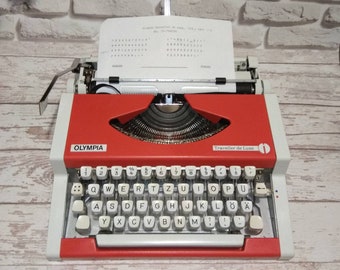 working vintage Olympia typewriter, vtg red manual typewriter, original suitcase, professionally serviced