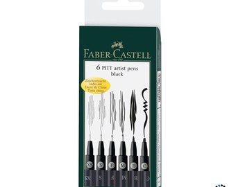 May include: A set of six black Faber-Castell Pitt artist pens in a green and black box. The pens are labelled with their nib sizes: XS, S, F, M, B, and C. The box also includes a sample of the different nib sizes.
