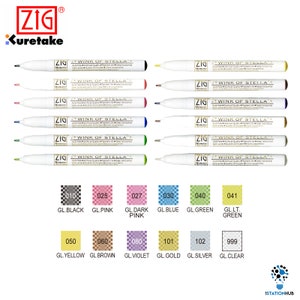 Peut inclure: Un ensemble de 12 stylos pinceaux Zig Wink of Stella Memory Color. Les stylos sont disposés en deux rangées de six. Les couleurs sont noir, rose, rose foncé, bleu, vert, vert clair, jaune, marron, violet, or, argent et transparent.