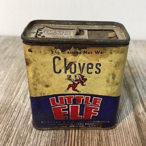1913 Kleine Elf Kruidnagelblikje met papieren etiket/Kleine Elf kan helpen
