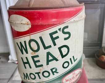 Lata de metal vintage de aceite de motor Wolf's Head/Petroliana de los años 50