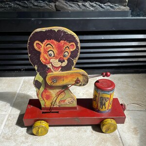 1952 Leo el baterista/Juguete de arrastre Fisher-Price/Obras