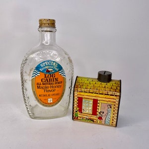 1960er Jahre Log Cabin Bank und 1976 Log Cabin Bicentennial Sirupflasche