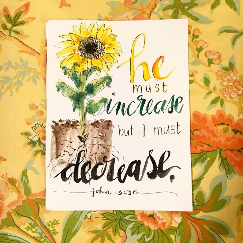 May include: Watercolor painting of a sunflower with roots and the text "He must increase but I must decrease. John 3:30."