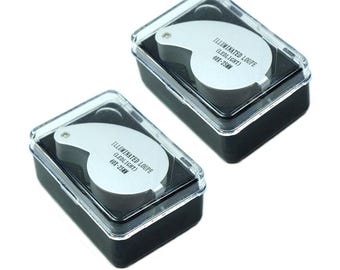 2 lupas de joyero mini iluminadas de 40x y 25 mm con luces LED