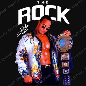 May include: A wrestler wearing a white and blue patterned shirt, black pants, and a blue and gold championship belt. The wrestler is holding the belt in his right hand and has a determined expression on his face. The text "THE ROCK" is written in white letters above the wrestler's head.