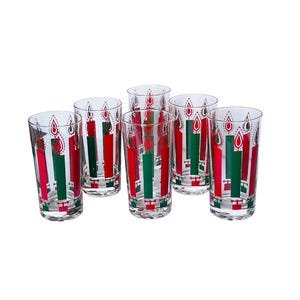 May include: Set of six clear drinking glasses. Each glass features a red, green, and white candle design. The glasses are cylindrical and suitable for beverages. Ideal for holiday gatherings or themed events.