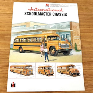May include: An advertisement for the International Schoolmaster Chassis. The image features a yellow school bus in front of a school building, with children and a bus driver. The advertisement also includes three smaller images of school buses.