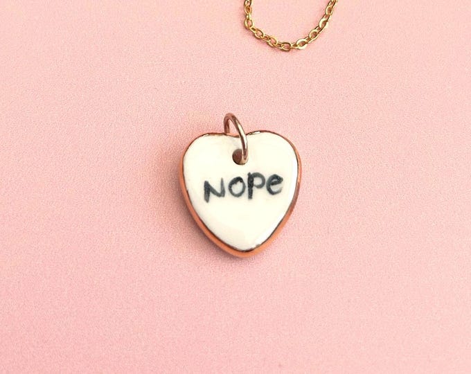 Handmade Ceramic Heart Pendant: ; 'Nope', Gold Lustre Edge