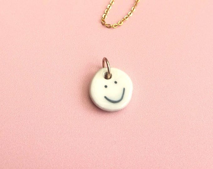 Double-Sided Ceramic Emotional Face Pendant