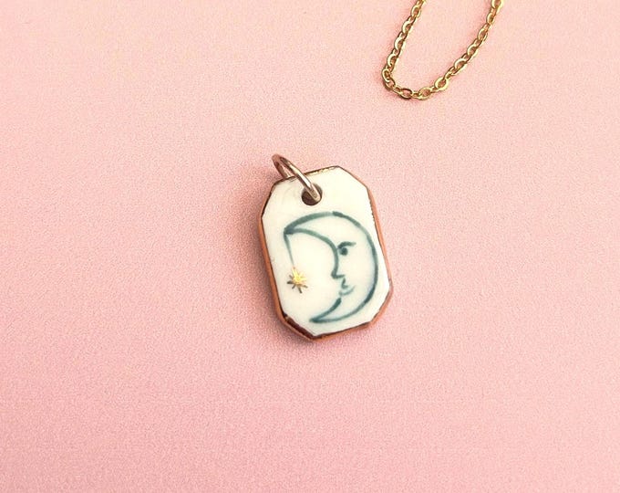 Hand-Painted Ceramic Celestial Moon Face Pendant (1.9cm)– Gold Lustre Edge