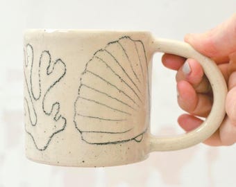 Handmade ceramic shell mug