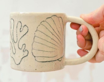 Handmade ceramic shell mug