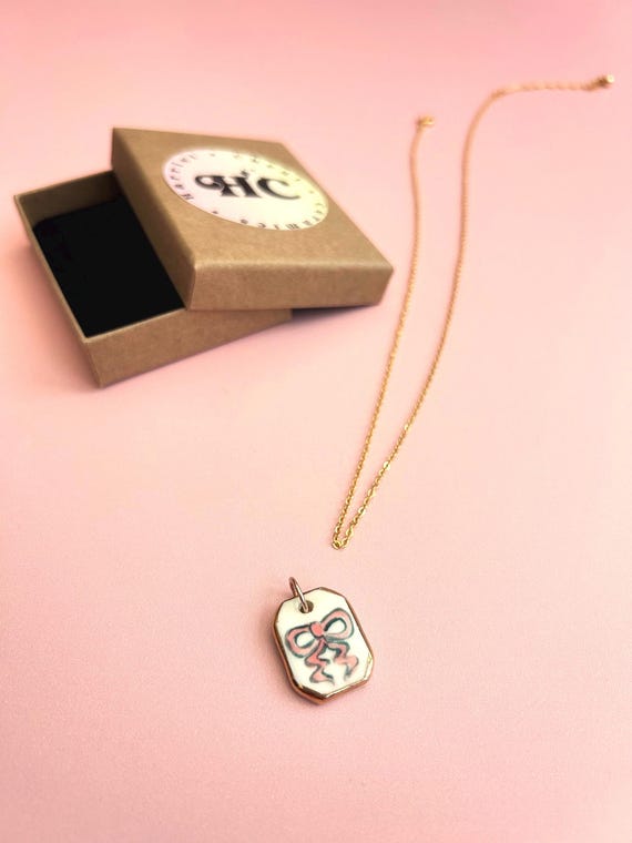 Hand-Painted Pink Ceramic Bow Pendant - Gold Luster Edge