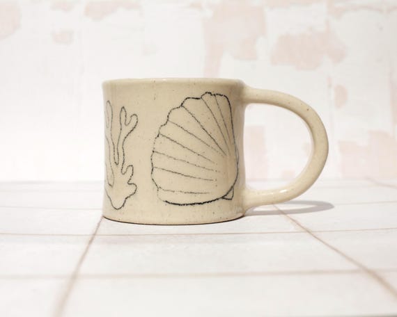 Handmade ceramic shell mug