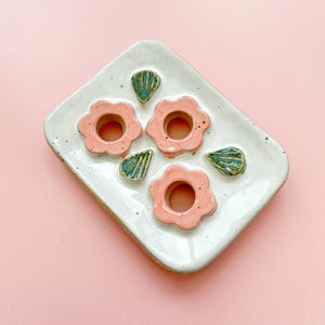 Handmade ceramic soap dish, pink flower design, green leaves, drainage holes, stoneware clay, footed soap dish, artisan bathroom decor