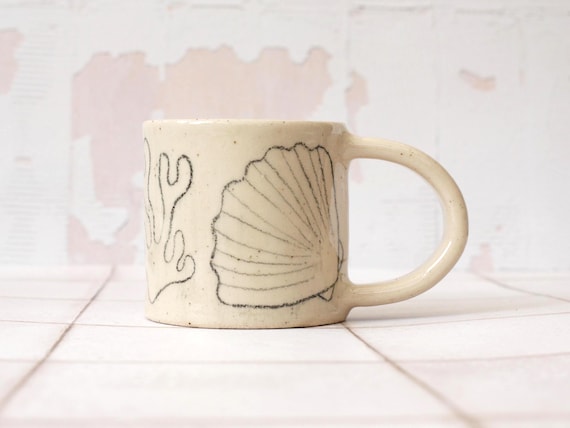Handmade ceramic shell mug