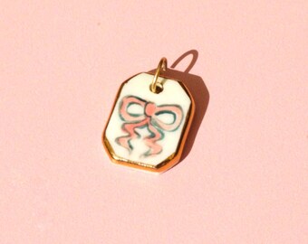 Pink Bow Pendant With Gold Lustre – Cute Ceramic Bow Pendant – Hand-Painted Ribbon Charm for Necklace
