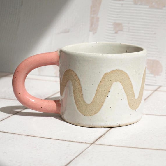 Handmade Ceramic Small Wavy Mug: Speckled Stoneware with Pink Handle